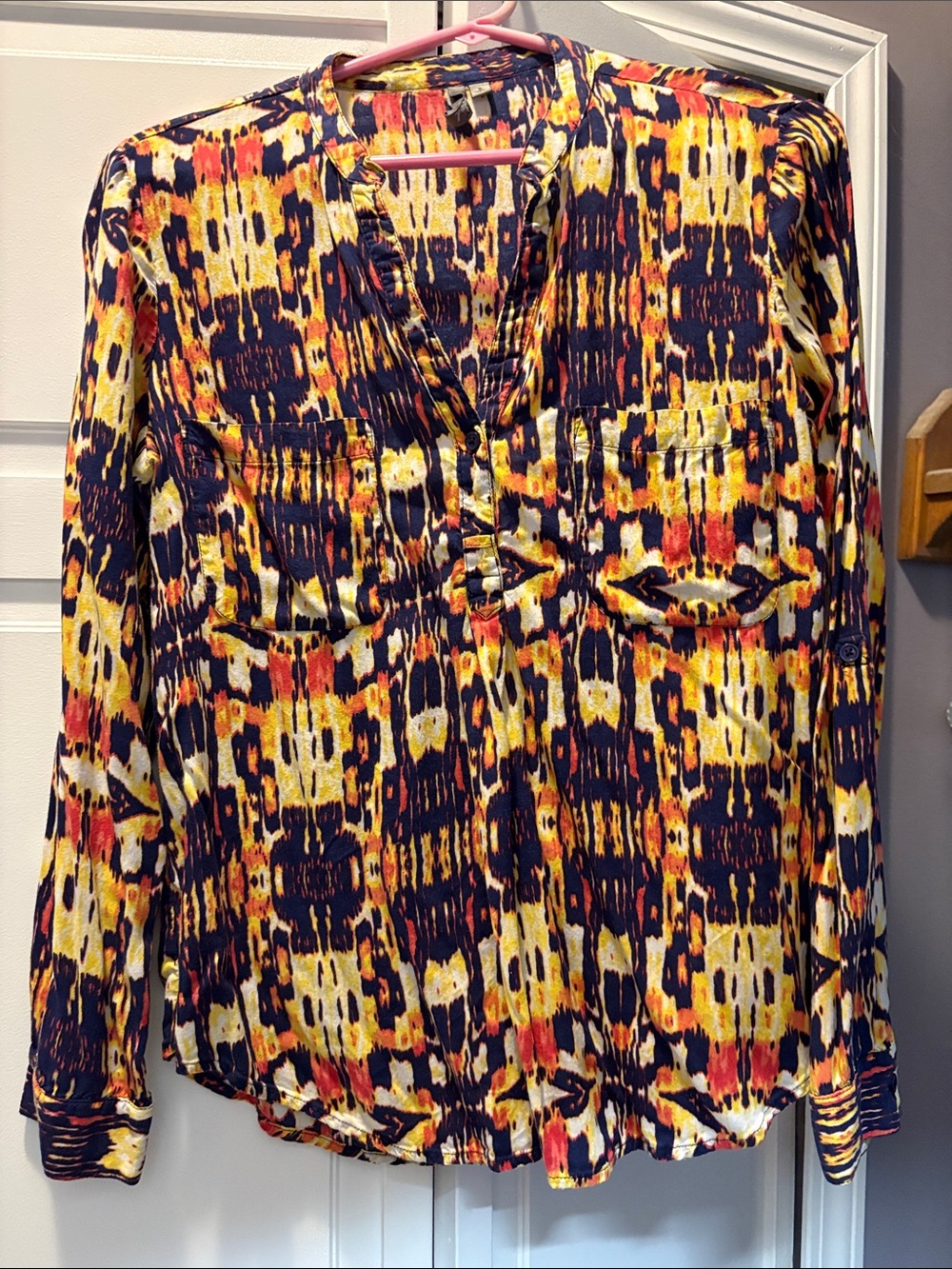 new directions Abstract Print Long Sleeve V-Neck Blouse in Yellow, Navy & Red